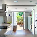 Апартаменти Cozy Townhouse In El Duque Адехе