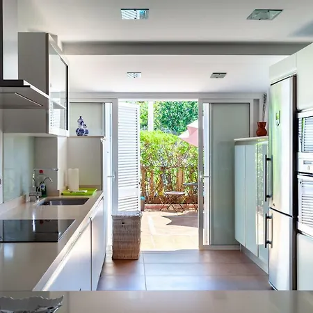 Апартаменты Cozy Townhouse In El Duque Адехе